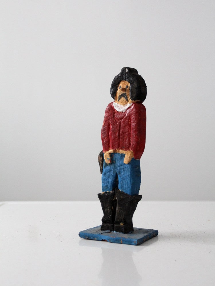 Handcrafted Vintage Wood Cowboy Figurine 10.5 Inch Folk Art: Handcrafted Vintage Wood Cowboy Figurine 10.5 Inch Folk Art Enhance your decor with this charming handcrafted wood cowboy figurine, showcasing classic cowboy details and hand-painted in rustic tones.