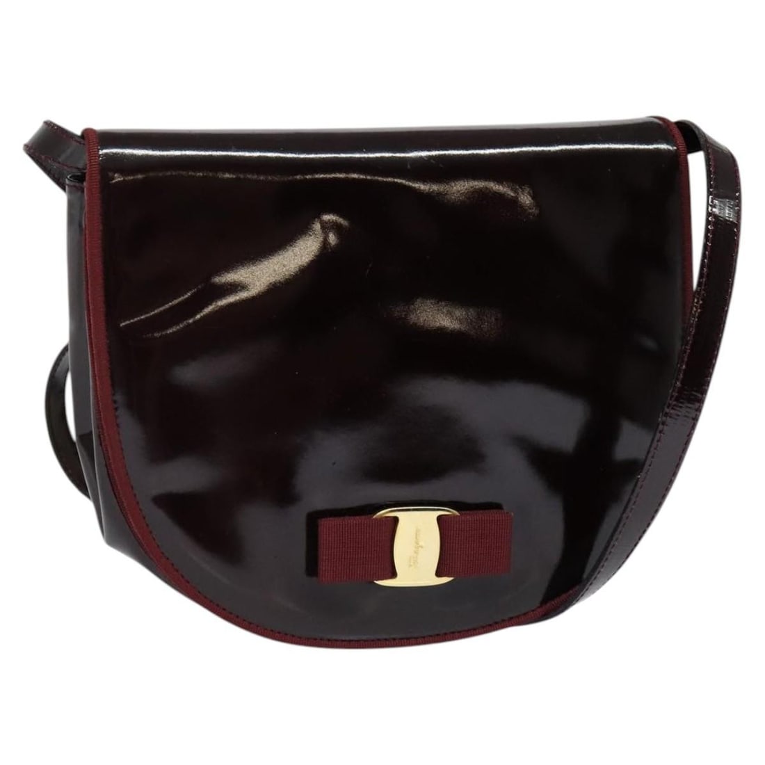 Vala Shoulder Bag in Burgundy Patent Leather by Salvatore Ferragamo: Vala Shoulder Bag in Burgundy Patent Leather by Salvatore Ferragamo This Salvatore Ferragamo Vala Shoulder Bag is crafted from burgundy patent leather and designed specifically for women. Made in Ital