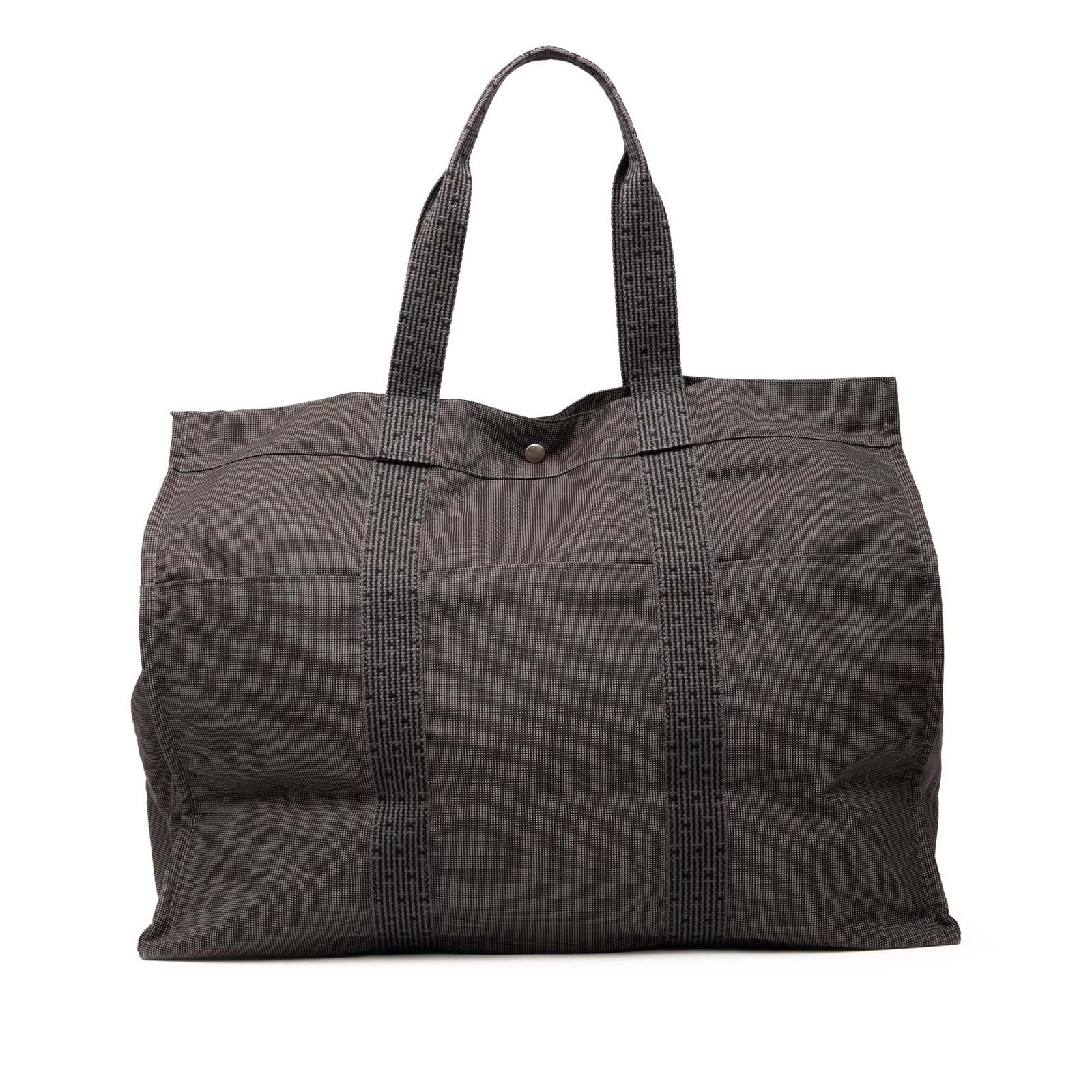 Hermes Herline GM Gray Canvas Tote Bag with Snap Closure: Hermes Herline GM Gray Canvas Tote Bag with Snap Closure The Hermes Herline GM is crafted from durable canvas in a gray color and features flat straps, exterior front and back slip pockets, an open to