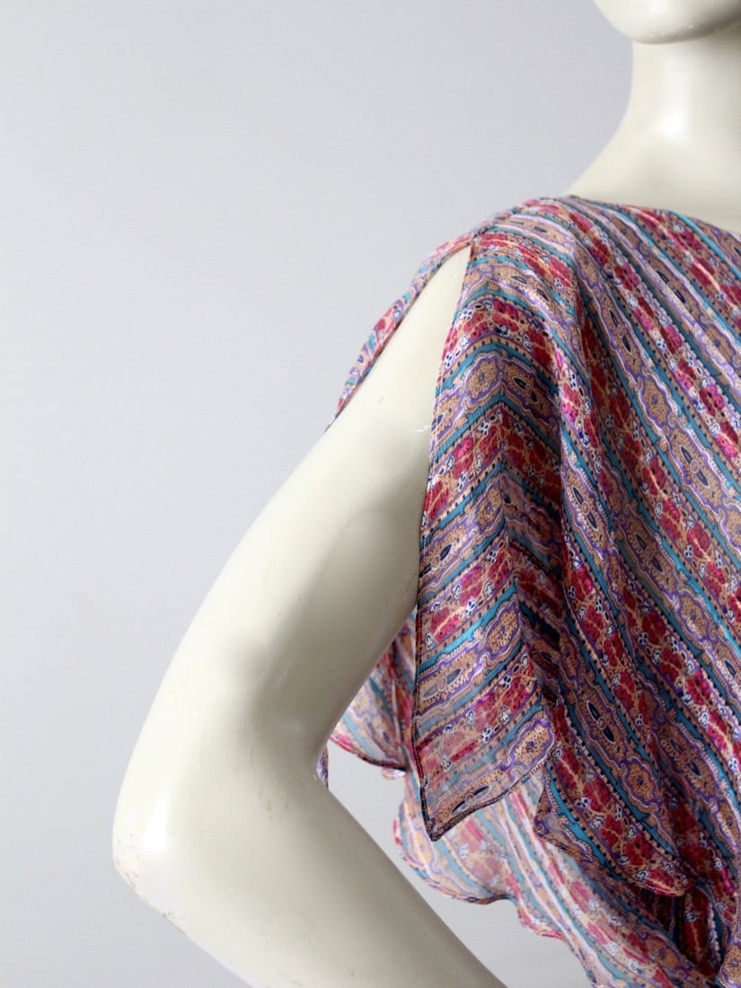 1970s Neiman Marcus Silk Dress with Stripes and Butterfly Sleeves: 1970s Neiman Marcus Silk Dress with Stripes and Butterfly Sleeves Discover this stunning vintage 1970s silk dress from Neiman Marcus. This eye-catching dress showcases a vibrant stripe print in purple