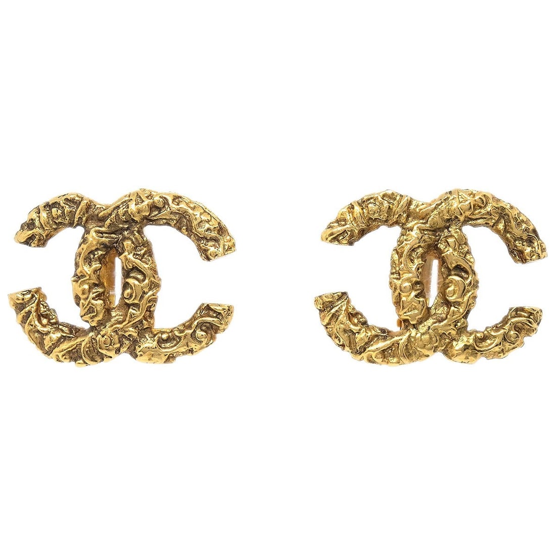Gold Plated CC Logo Clip-On Earrings by Chanel 93A: Gold Plated CC Logo Clip-On Earrings by Chanel 93A These Chanel CC clip-on earrings feature the iconic interlocking CC logo in a gold tone. Crafted from gold-plated metal, they offer a classic logo-th