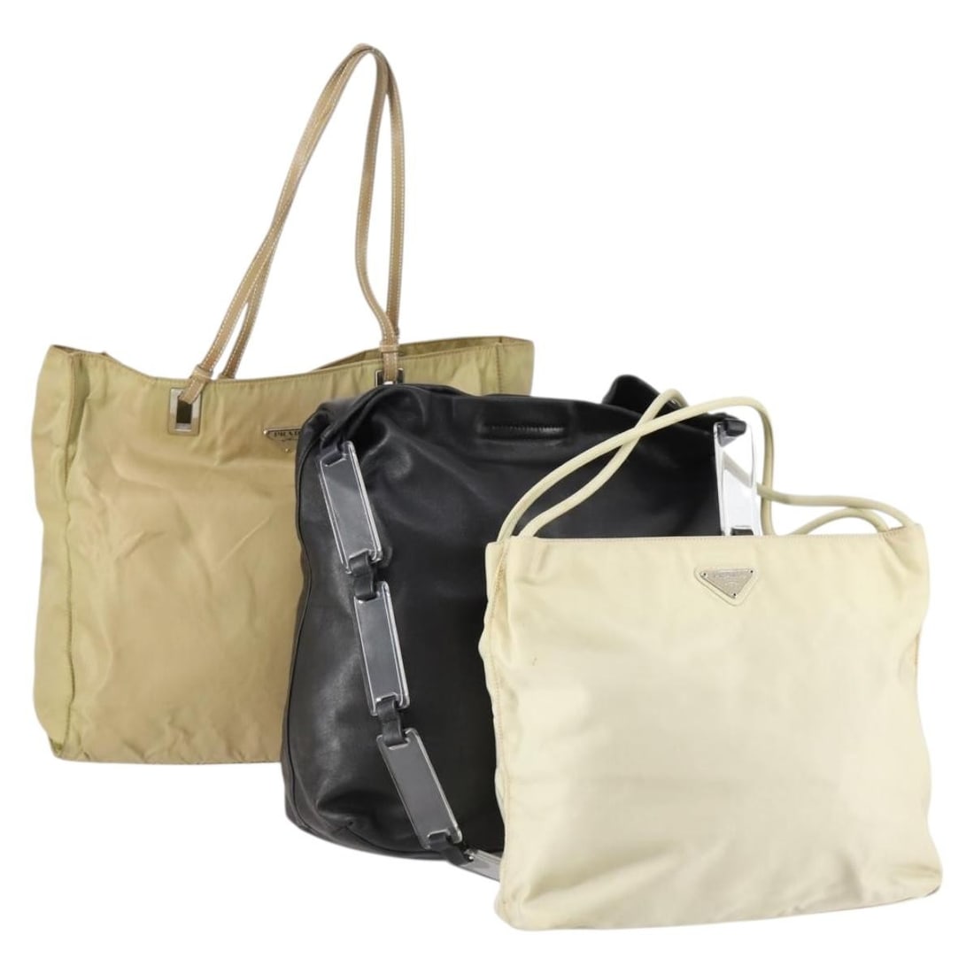 PRADA Beige Black Nylon Leather Tote Bag 3 Piece Set Auth: PRADA Beige Black Nylon Leather Tote Bag 3 Piece Set Auth Presenting a vintage PRADA Tote Bag set, crafted with a durable nylon exterior featuring a stylish beige and black color combination. This tot