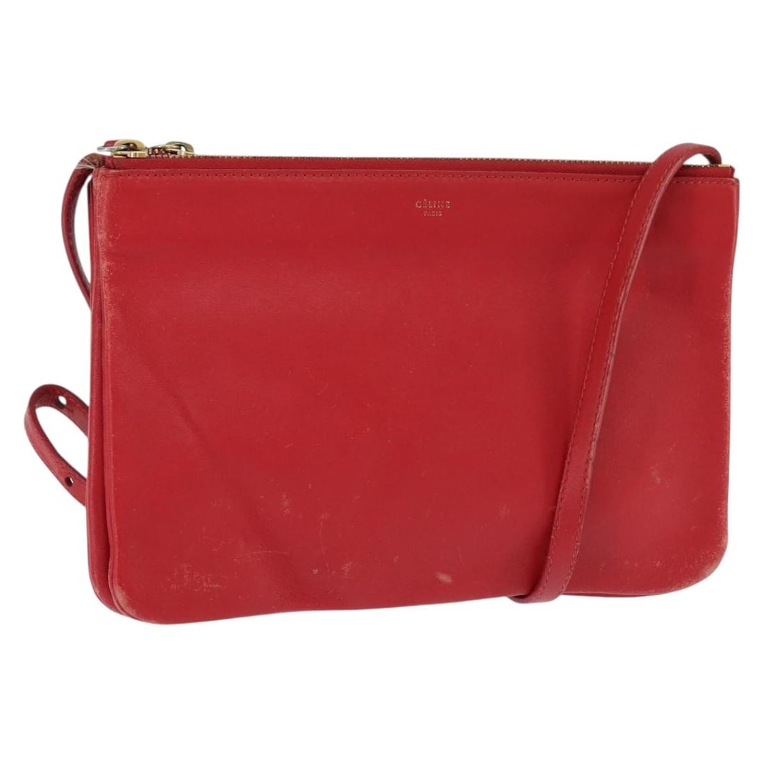 CELINE Red Gold Leather Trio Shoulder Bag Authentic Italy: CELINE Red Gold Leather Trio Shoulder Bag Authentic Italy This CELINE Trio Shoulder Bag is a stylish accessory crafted from high-quality leather in a striking red and gold color combination. Designed