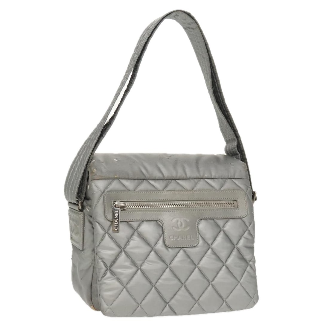 CHANEL Coco Cocoon Silver Shoulder Bag Coated Canvas Italy Auth: CHANEL Coco Cocoon Silver Shoulder Bag Coated Canvas Italy Auth This authentic CHANEL Coco Cocoon Shoulder Bag is a stylish accessory crafted from coated canvas in a striking silver hue. Designed for