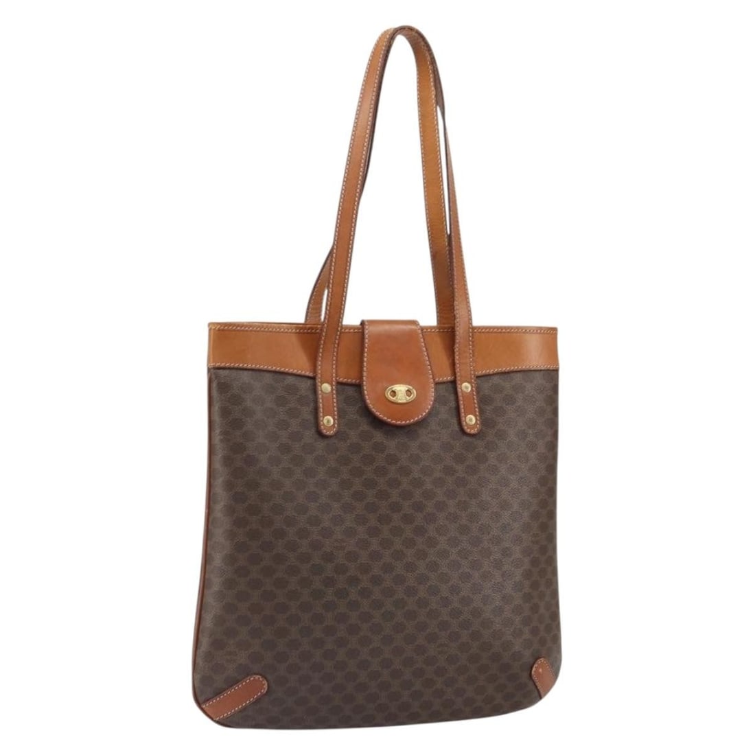Celine Macadam Brown PVC Canvas Tote with Leather Trim Gold Accents: Celine Macadam Brown PVC Canvas Tote with Leather Trim Gold Accents This CELINE Macadam Canvas tote bag features a brown and gold color scheme with PVC leather and Macadam canvas construction. The bag