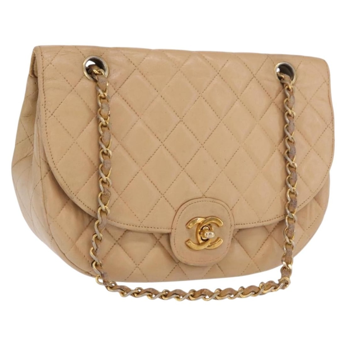 Chanel Beige Lambskin Matelasse Chain Shoulder Bag Gold CC France Repainted: Chanel Beige Lambskin Matelasse Chain Shoulder Bag Gold CC France Repainted This CHANEL Matelasse chain shoulder bag is crafted from beige lambskin leather with gold-tone accents. The leather has been