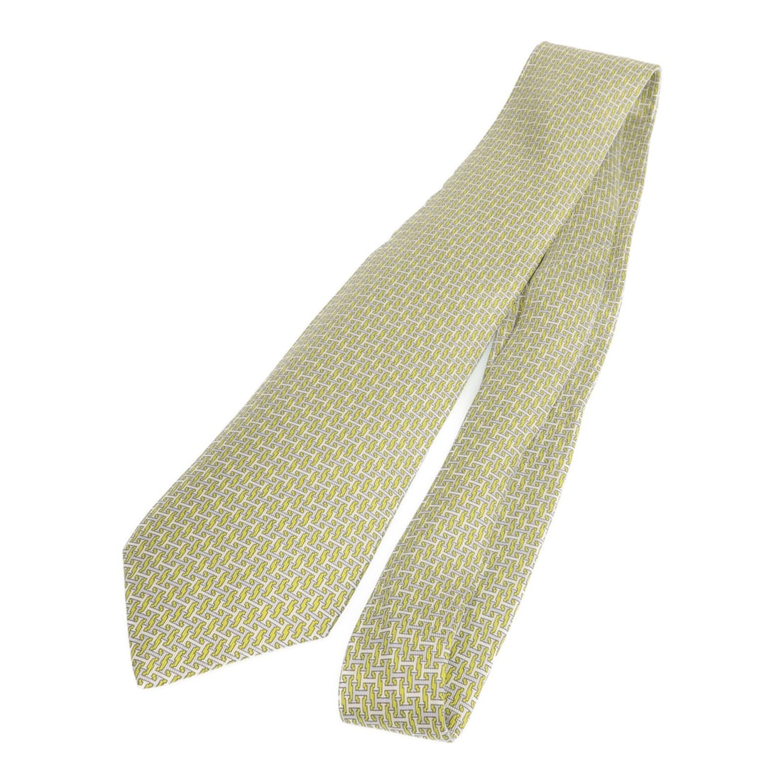 Green Silk Tie by HERMES France: Green Silk Tie by HERMES France This Hermes necktie is crafted from luxurious silk in a green color, offering a classic and refined accessory. Made in France, it features a regular size type and is in