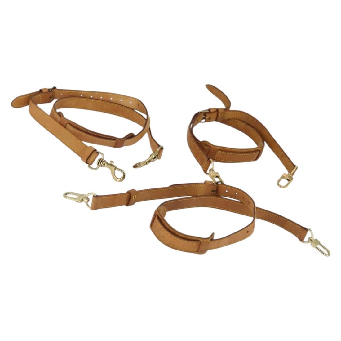 Set of 3 Beige Leather Shoulder Straps Louis Vuitton Authentic: Set of 3 Beige Leather Shoulder Straps Louis Vuitton Authentic This set includes three beige leather shoulder straps by Louis Vuitton, made in France. The straps show heavy use with surface wear such