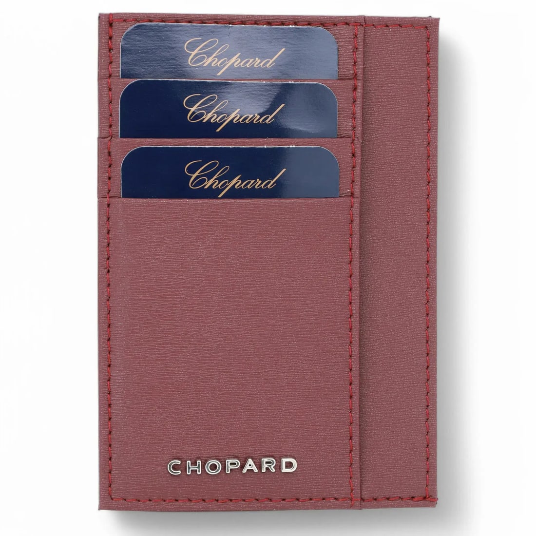 Chopard Classic Bordeaux Leather Card Holder Wallet 95012-0363 with Silver Hardware: Chopard Classic Bordeaux Leather Card Holder Wallet 95012-0363 with Silver Hardware Introducing the Chopard Classic Bordeaux Grained Leather Large Card Holder Wallet, a sophisticated accessory crafted