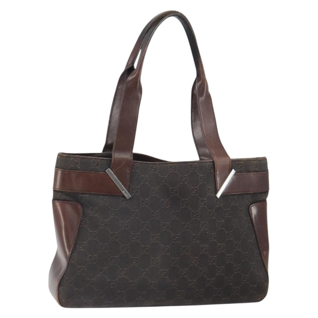 Brown Silver GG Canvas Gucci Tote 73983 Made in Italy: Brown Silver GG Canvas Gucci Tote 73983 Made in Italy This GUCCI GG Canvas Tote Bag features a brown and silver color scheme with the signature GG canvas exterior. The bag is crafted in Italy and offe