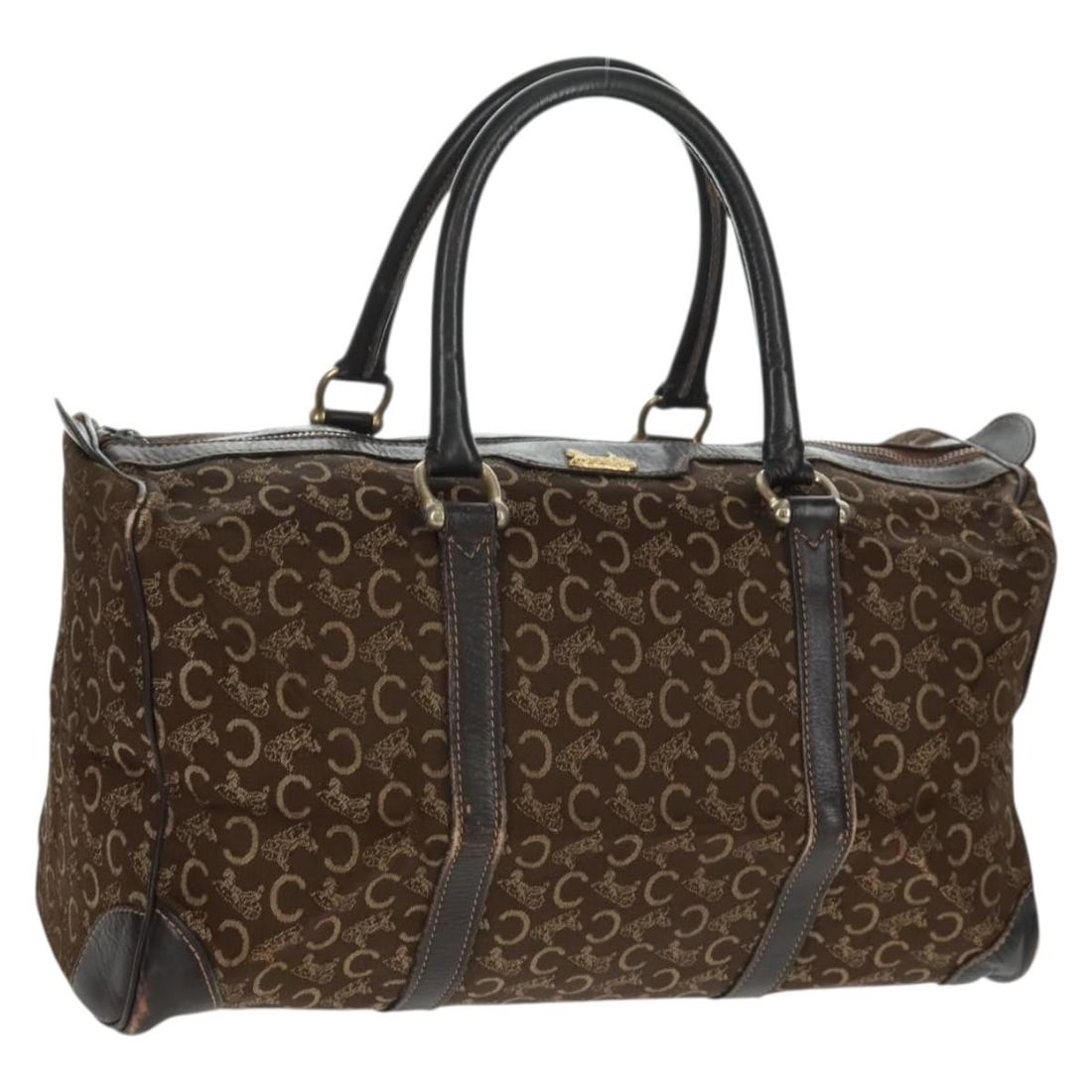 Celine Sulky Boston Canvas Bag in Brown and Gold Tone: Celine Sulky Boston Canvas Bag in Brown and Gold Tone This CELINE C Sulky Boston Bag is crafted from brown and gold canvas with C Macadam canvas detailing. Made in Italy, it features a spacious interi