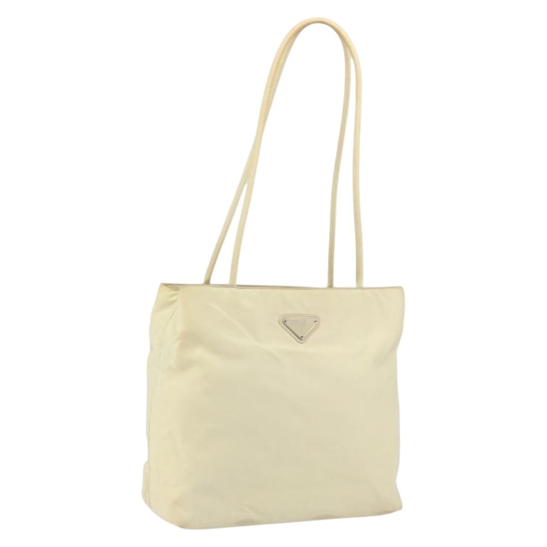 Beige and Silver Nylon Tote Bag by PRADA with Guarantee Card: Beige and Silver Nylon Tote Bag by PRADA with Guarantee Card This PRADA tote bag features a beige and silver nylon exterior with a spacious interior, making it ideal for everyday use. The bag is made