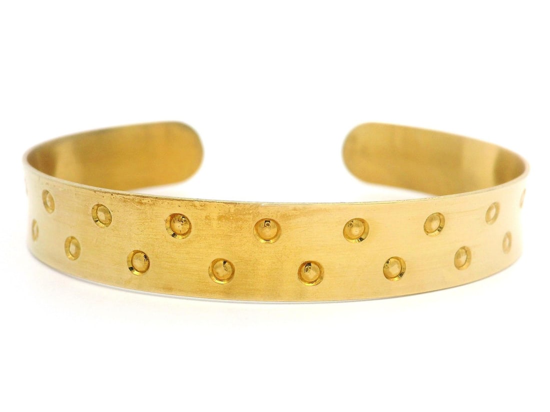 Italian Vermeil Gold Sterling Silver Open Cuff Bracelet: Italian Vermeil Gold Sterling Silver Open Cuff Bracelet This stunning open cuff bracelet showcases a polished circle design, crafted from vermeil yellow gold over sterling silver. With a comfortable f