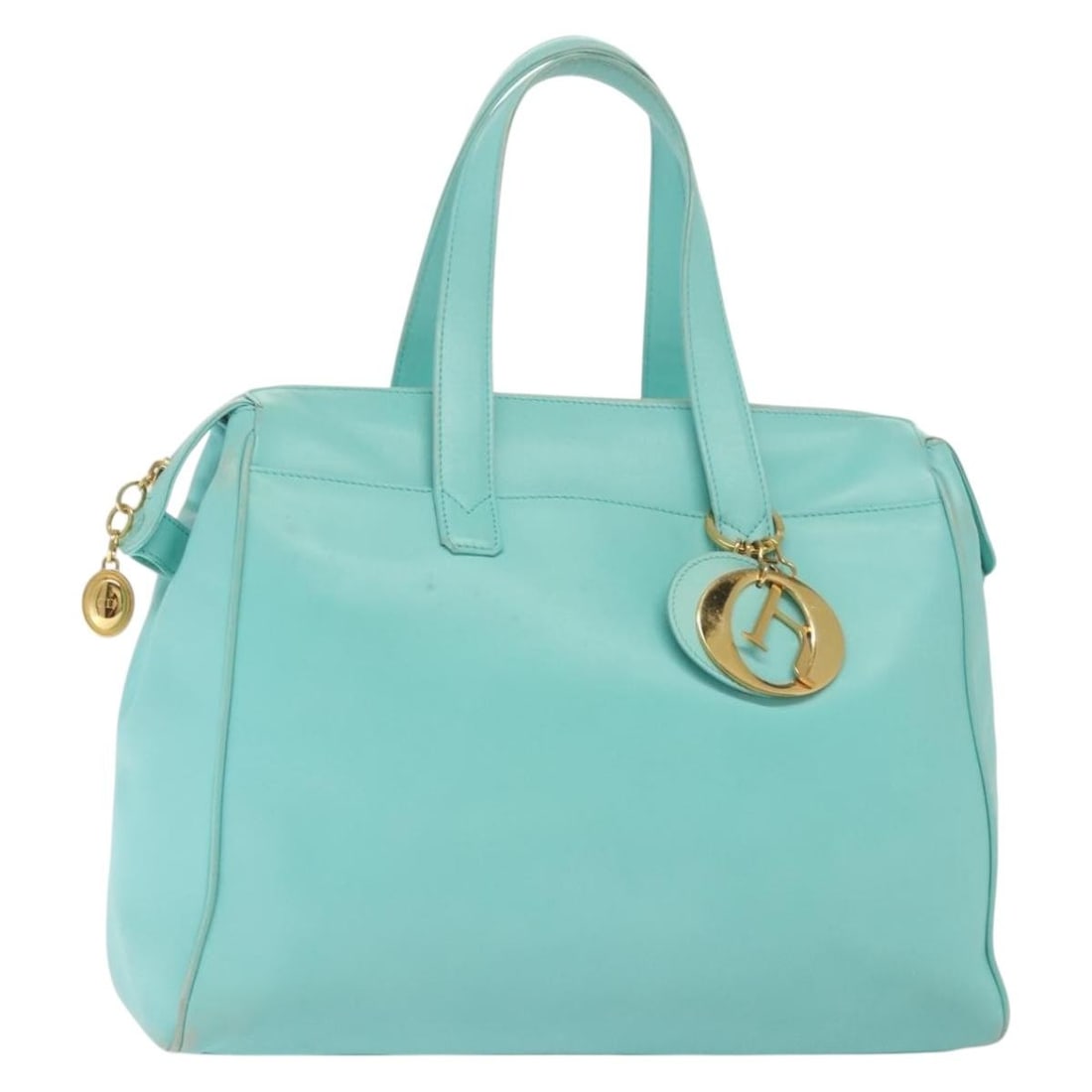 Christian Dior Light Blue Leather Tote Bag with Gold Accents: Christian Dior Light Blue Leather Tote Bag with Gold Accents This elegant Christian Dior Tote Bag is crafted from high-quality leather in a charming light blue and gold color scheme, making it a styli