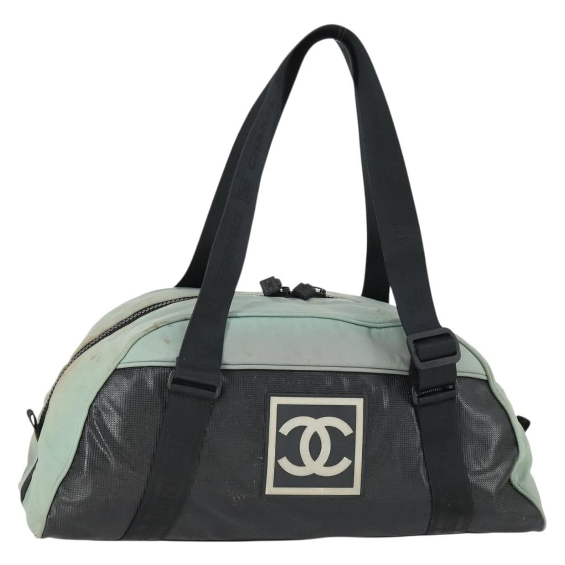 Black Gray Nylon Boston Bag by Chanel Made in Italy: Black Gray Nylon Boston Bag by Chanel Made in Italy This CHANEL Boston Bag features a black and gray nylon exterior with a spacious design ideal for daily use. Crafted in Italy, the bag shows signs of