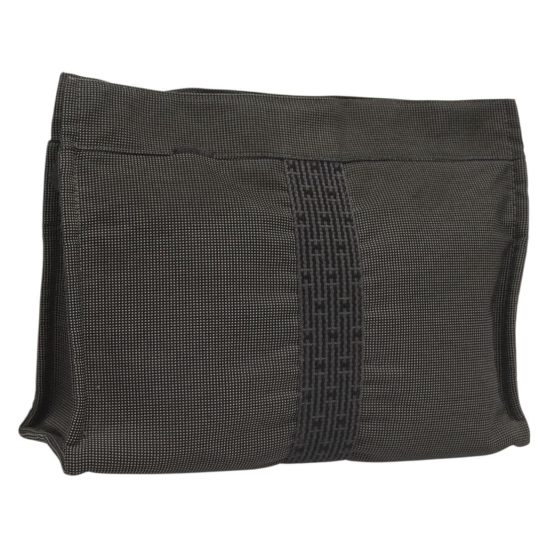 HERMES Her Line Gray Canvas Clutch Bag Made in France: HERMES Her Line Gray Canvas Clutch Bag Made in France This authentic HERMES Her Line Clutch Bag blends elegance with practicality, crafted from durable gray canvas. With ample space for essentials, it