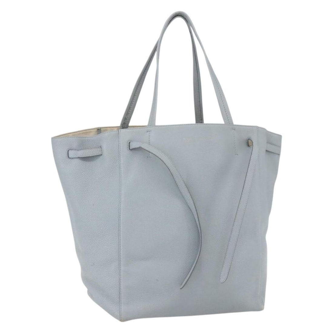 Light Blue Leather Cabas Phantom Tote by CELINE Gold Tone Accents: Light Blue Leather Cabas Phantom Tote by CELINE Gold Tone Accents This is a CELINE Cabas Phantom tote bag crafted from light blue leather with gold-tone accents. The bag features a spacious interior,