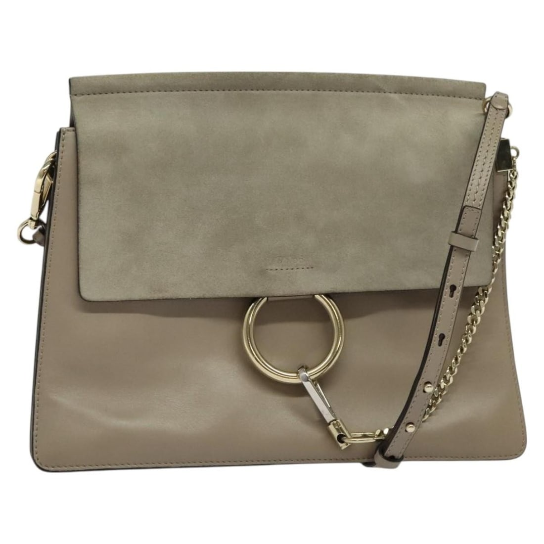 Chloe Fay Gray Suede Leather Shoulder Bag with Gold Accents: Chloe Fay Gray Suede Leather Shoulder Bag with Gold Accents Introducing the Chloe Fay Shoulder Bag, a stylish and sophisticated accessory crafted from premium suede leather in a chic gray and gold col