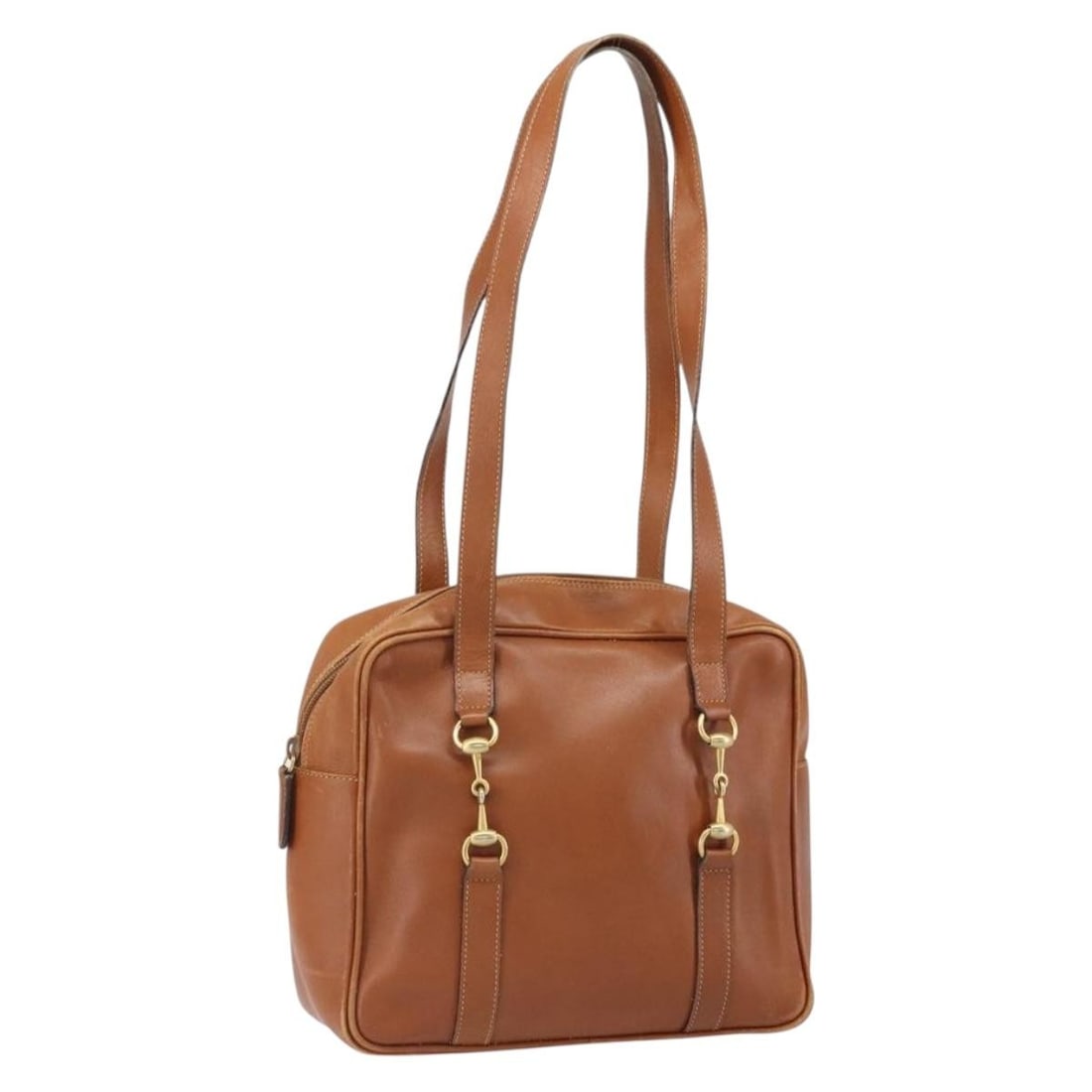 Brown Leather Gucci Handbag with Gold Accents Italy: Brown Leather Gucci Handbag with Gold Accents Italy This Gucci handbag features a brown and gold leather exterior with gold-tone accents. The bag offers a spacious interior and is made in Italy. It in