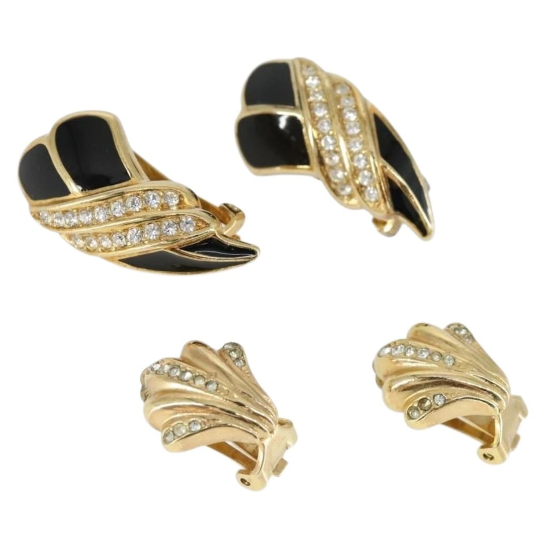 Set of 2 Christian Dior Gold Tone Metal Earrings: Set of 2 Christian Dior Gold Tone Metal Earrings This is a set of Christian Dior earrings crafted from metal with a gold tone finish. The earrings exhibit signs of heavy use, including slight surface