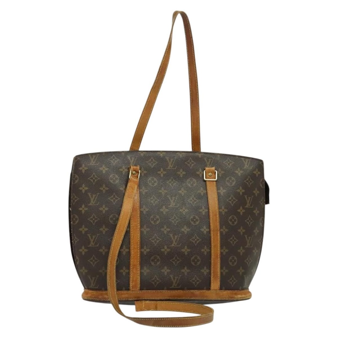 Monogram Canvas Babylone Tote M51102 by Louis Vuitton France: Monogram Canvas Babylone Tote M51102 by Louis Vuitton France This Louis Vuitton Monogram Babylone Tote Bag features the iconic Monogram canvas with leather trim. The bag has a spacious interior and is