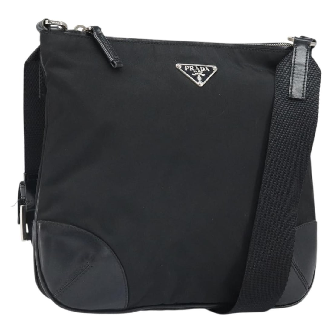 Prada Black Nylon and Leather Shoulder Bag Silver Tone Hardware: Prada Black Nylon and Leather Shoulder Bag Silver Tone Hardware This PRADA shoulder bag is crafted from black nylon with leather accents and features silver-tone hardware. It offers a compact, square