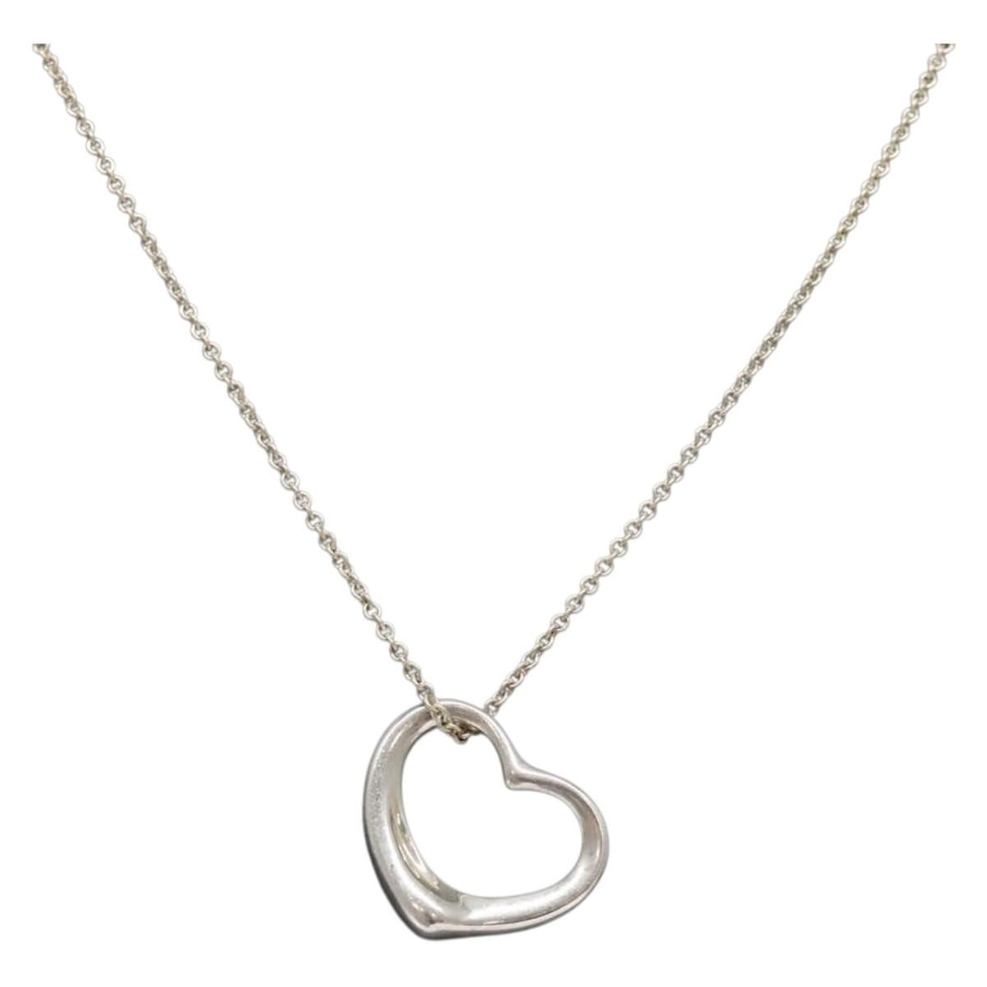 Tiffany & Co. Open Heart Necklace Ag925 Silver Authentic: Tiffany & Co. Open Heart Necklace Ag925 Silver Authentic This stunning Tiffany & Co. Open Heart Necklace is crafted from high-quality Ag925 silver, showcasing a timeless design that symbolizes love an