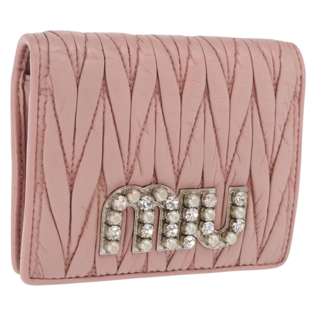 Pink Leather Matelasse Wallet by Miu Miu with Silver Accents: Pink Leather Matelasse Wallet by Miu Miu with Silver Accents This Miu Miu Matelasse wallet is crafted from pink leather with silver-tone accents. The compact design features a textured exterior and am