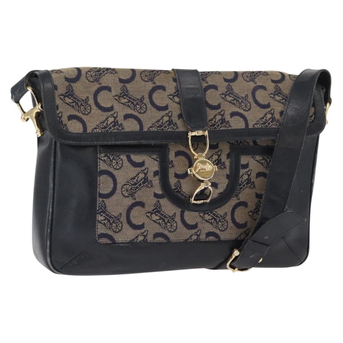 Navy Canvas Celine Sulky Shoulder Bag with Gold Accents France: Navy Canvas Celine Sulky Shoulder Bag with Gold Accents France This is a CELINE C Sulky shoulder bag crafted from navy and gold canvas. Made in France, the bag features C Macadam canvas and has a stru