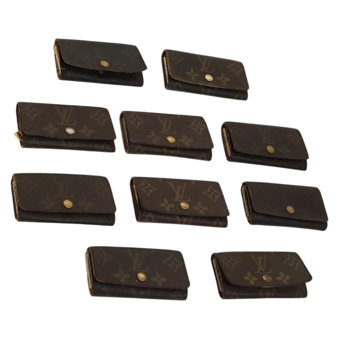 LOUIS VUITTON Monogram Key Case 10 Piece Set Auth CB067: LOUIS VUITTON Monogram Key Case 10 Piece Set Auth CB067 This authentic Louis Vuitton Monogram Key Case showcases the iconic monogram canvas, a hallmark of luxury and style. Designed as a key case, it