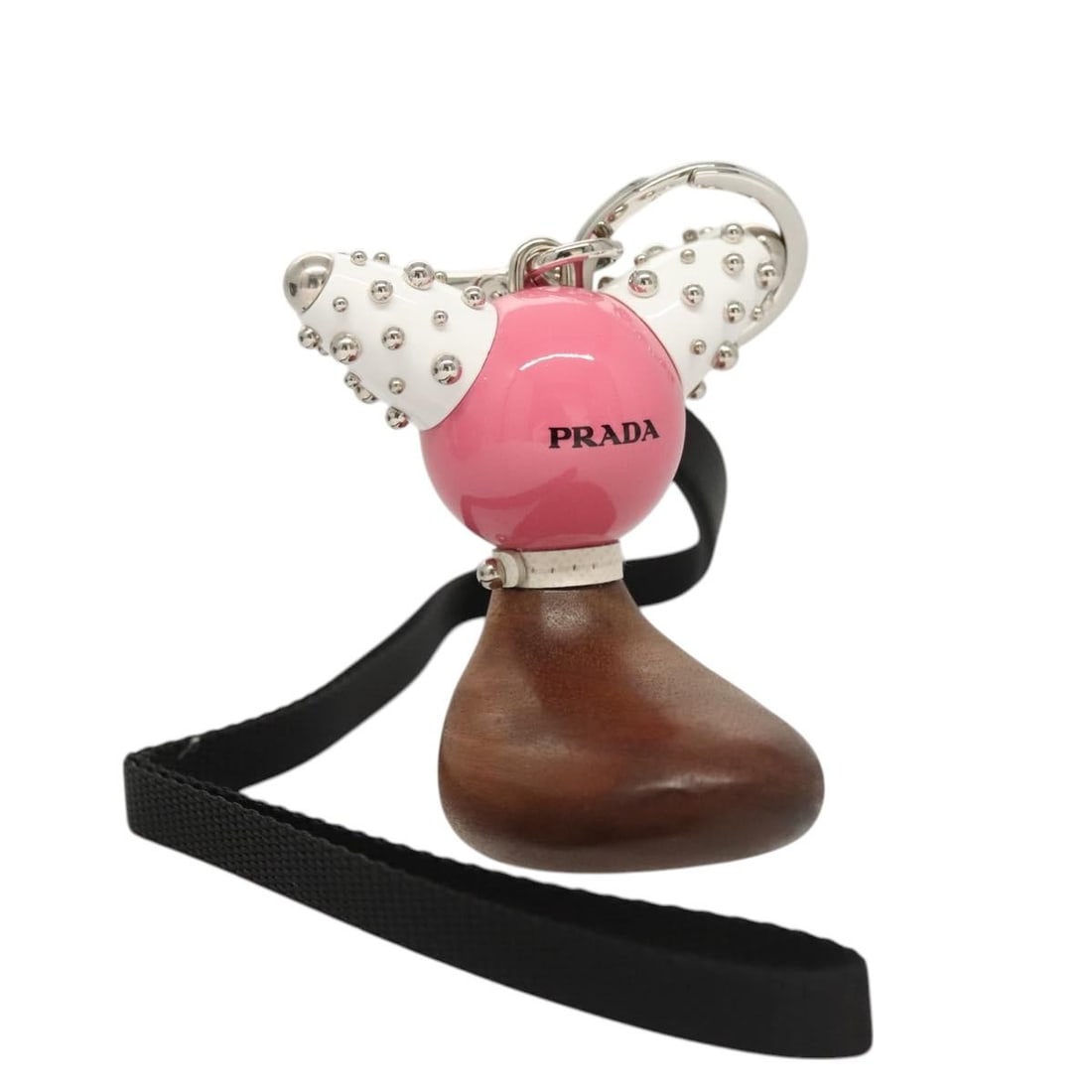 PRADA Pink Metal Key Holder Made in Italy: PRADA Pink Metal Key Holder Made in Italy Elevate your accessory collection with this authentic PRADA Key Holder. Crafted from high-quality metal, this stylish key holder features a vibrant pink color
