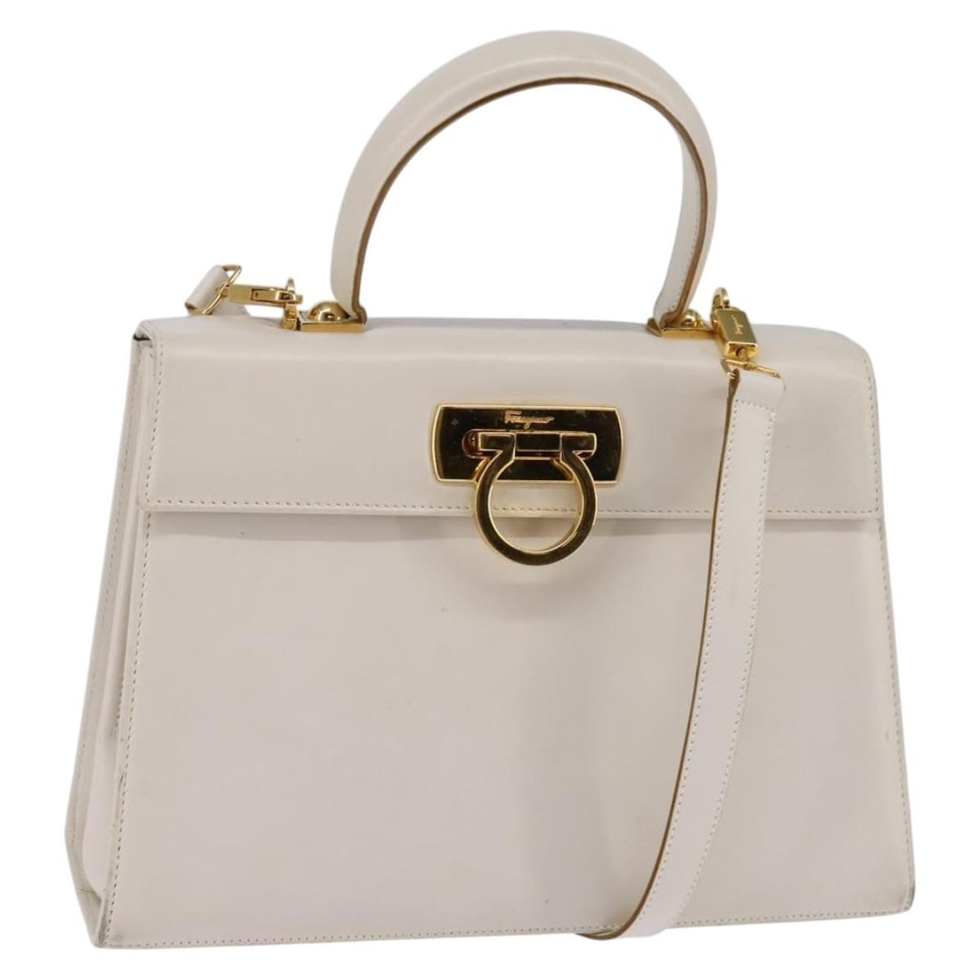 Salvatore Ferragamo Gancini Leather Hand Bag White Gold Authentic 2-Way: Salvatore Ferragamo Gancini Leather Hand Bag White Gold Authentic 2-Way The Salvatore Ferragamo Gancini Hand Bag is a luxurious accessory crafted from premium leather. This stylish hand bag features a