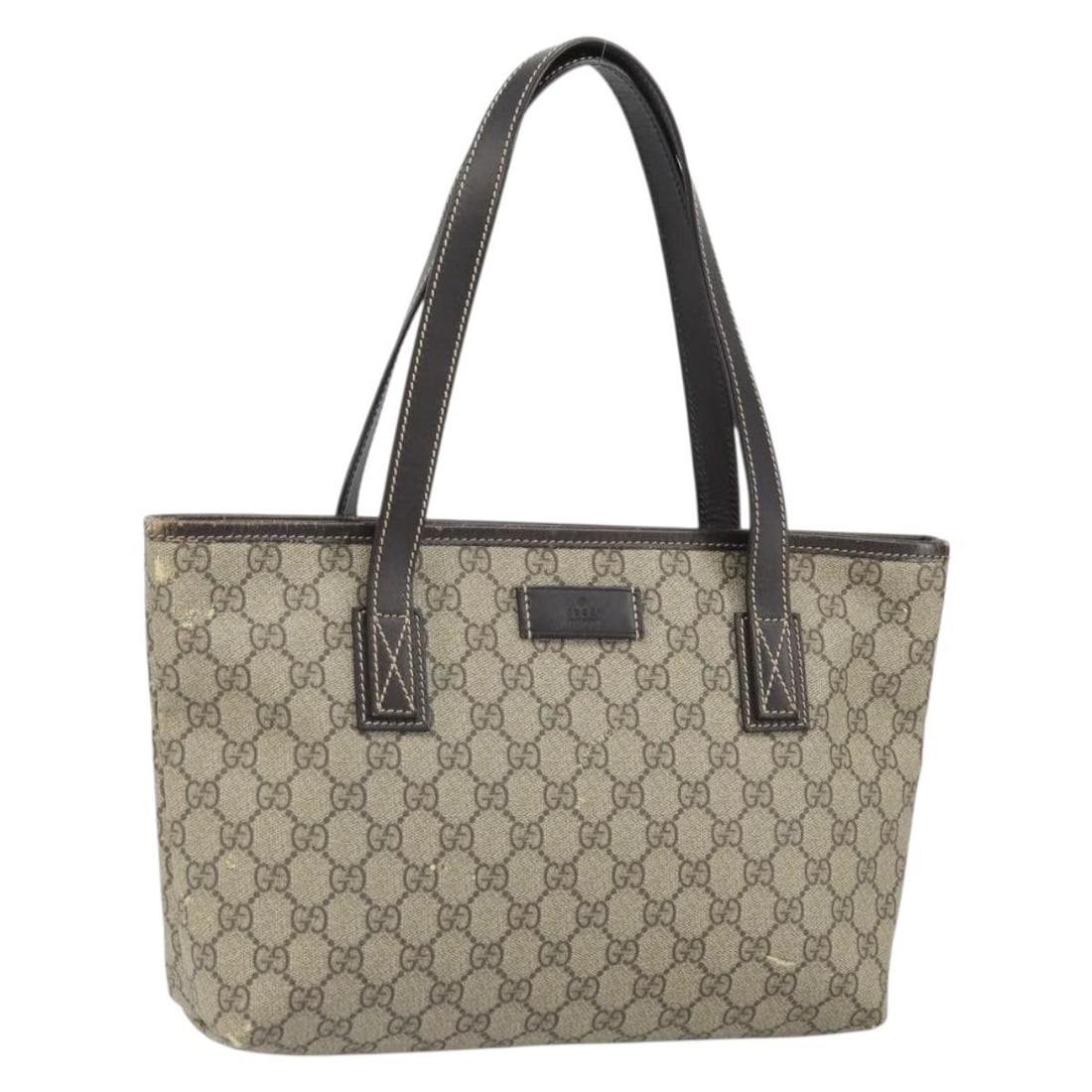 Beige GG Supreme 211138 Tote Bag by Gucci in PVC Canvas: Beige GG Supreme 211138 Tote Bag by Gucci in PVC Canvas This is a Gucci GG Supreme tote bag crafted from beige PVC leather and GG canvas. The bag features dual top handles and an open main compartment