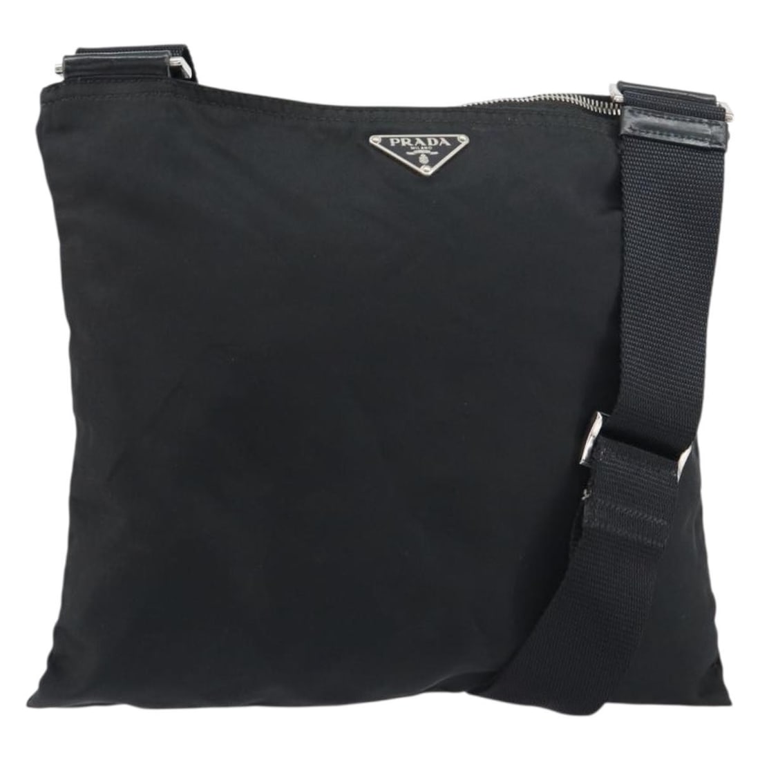 Prada Black Nylon Shoulder Bag with Silver Accents and Guarantee Card: Prada Black Nylon Shoulder Bag with Silver Accents and Guarantee Card This PRADA shoulder bag features a black nylon exterior with silver-tone accents. Designed for versatility, it includes an adjusta