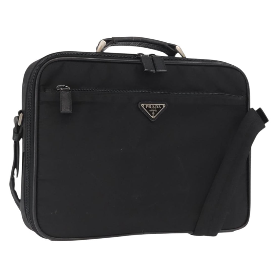 Prada Black Nylon Two Way Handbag with Silver Accents and Shoulder Strap: Prada Black Nylon Two Way Handbag with Silver Accents and Shoulder Strap This PRADA 2-way hand bag features a black nylon exterior with silver-tone accents. Designed for versatility, it can be carried