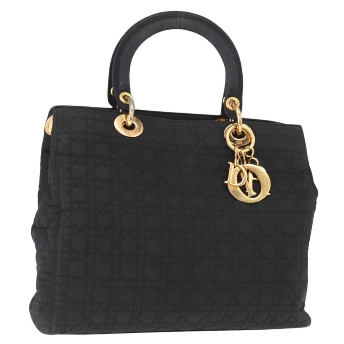 Lady Dior Black Nylon Handbag with Gold Accents by Christian Dior: Lady Dior Black Nylon Handbag with Gold Accents by Christian Dior This Christian Dior Lady Dior Canage handbag is crafted from black nylon with gold-tone accents. Designed in Italy, it features a stru