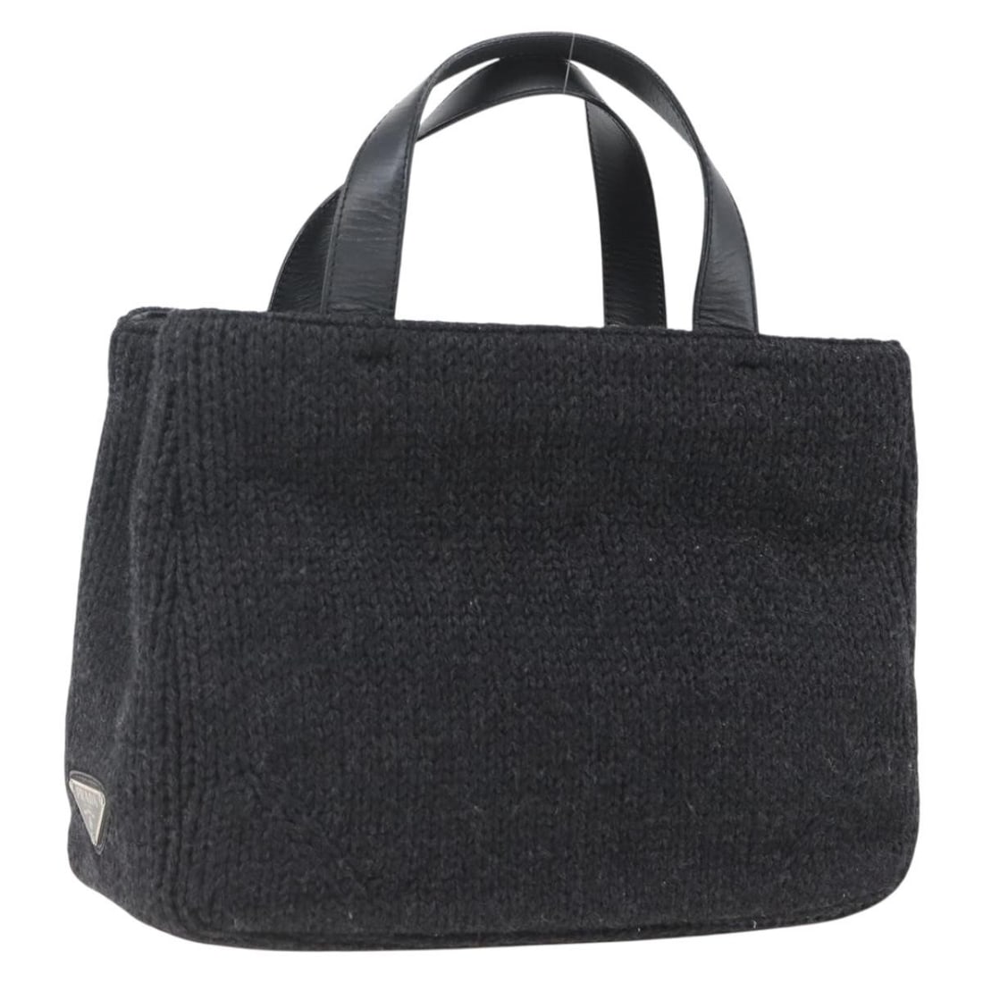 Prada Black Wool Handbag with Guarantee Card Italy SW2085: Prada Black Wool Handbag with Guarantee Card Italy SW2085 This PRADA handbag is crafted from black wool and features a classic hand bag style. Made in Italy, it includes a guarantee card as an accesso