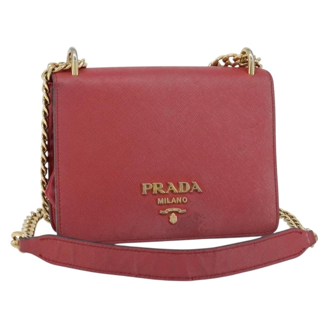 Red Saffiano Leather PRADA Shoulder Bag with Chain Strap Gold Accents: Red Saffiano Leather PRADA Shoulder Bag with Chain Strap Gold Accents This PRADA chain shoulder bag is crafted from Saffiano leather in red with gold-tone accents. Made in Italy, it features a compact