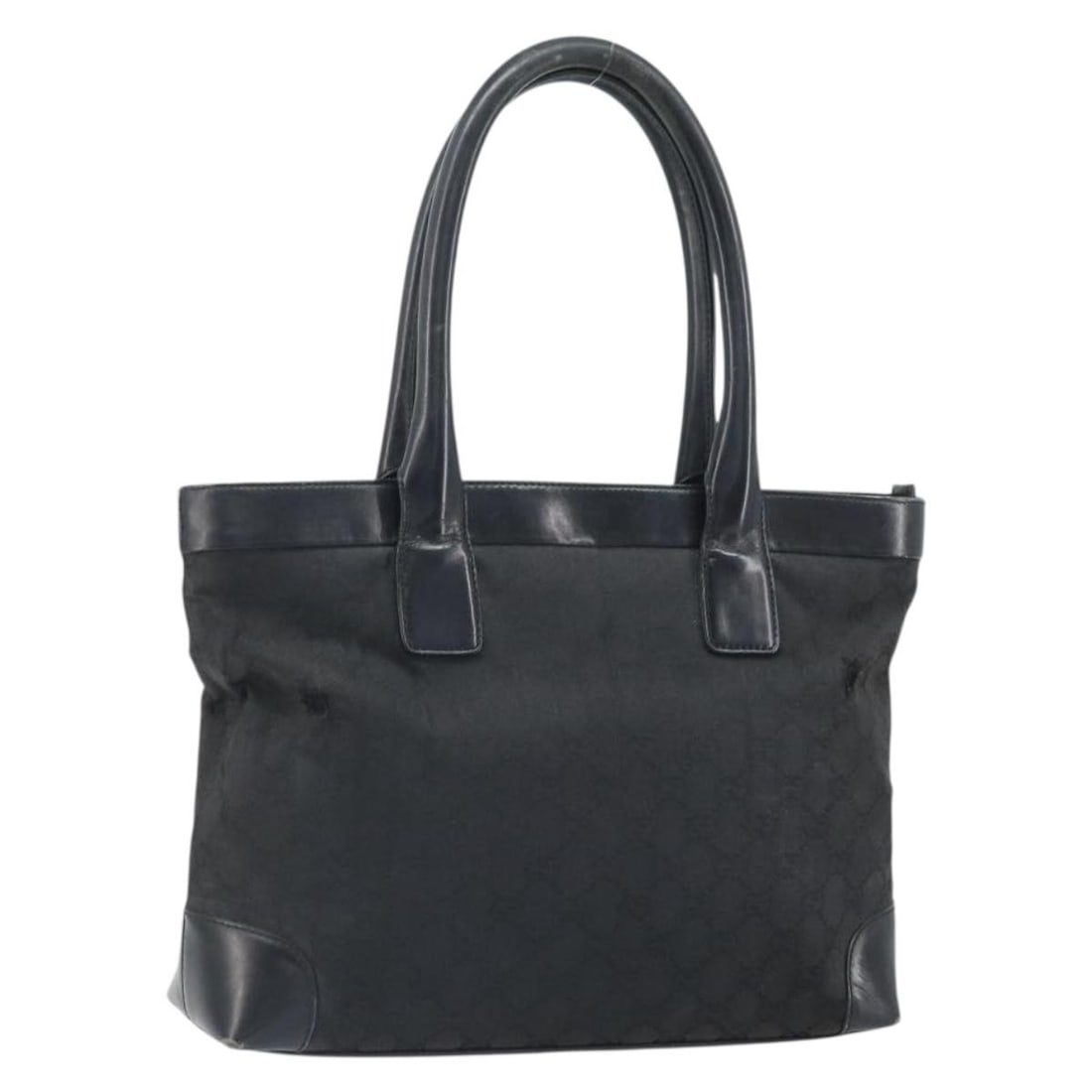 Black GG Canvas Gucci 33890 Handbag with Silver Accents Italy: Black GG Canvas Gucci 33890 Handbag with Silver Accents Italy This GUCCI GG Canvas hand bag features a black and silver color scheme with GG canvas exterior. The bag is made in Italy and includes a to