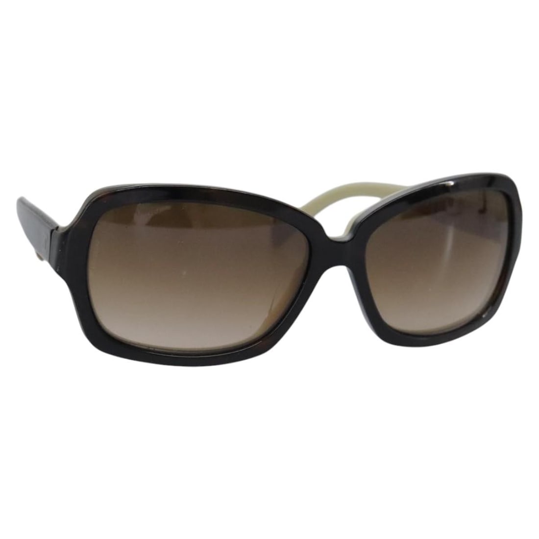 CHANEL Brown Plastic Sunglasses Authentic Made in Italy: CHANEL Brown Plastic Sunglasses Authentic Made in Italy Elevate your style with these authentic CHANEL sunglasses, expertly crafted in Italy. The sunglasses feature a sleek brown plastic frame that co