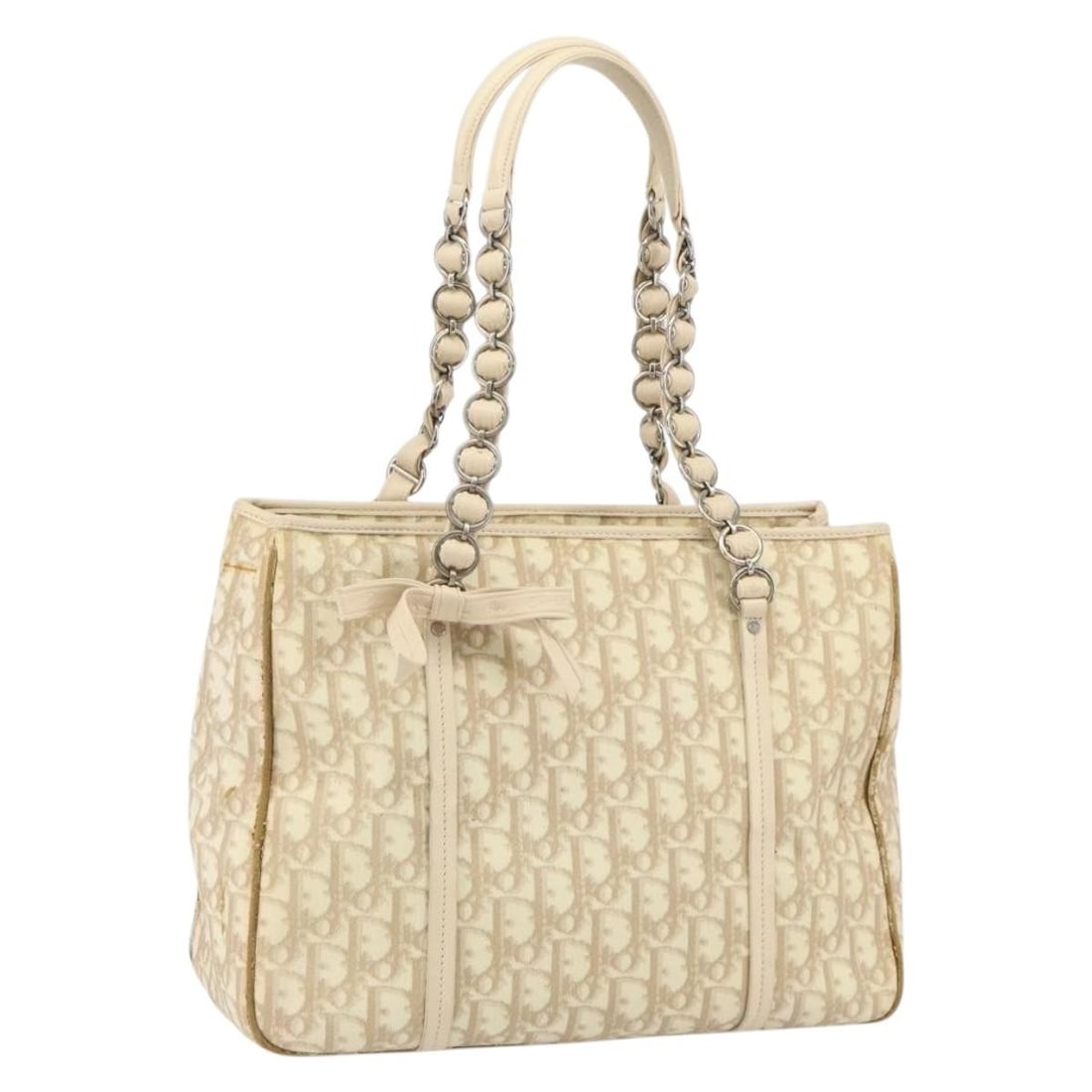 Beige Silver PVC Trotter Canvas Romantic Tote by Christian Dior: Beige Silver PVC Trotter Canvas Romantic Tote by Christian Dior This Christian Dior Trotter Canvas Romantic Tote Bag features beige and silver tones with a combination of PVC leather and Trotter canva