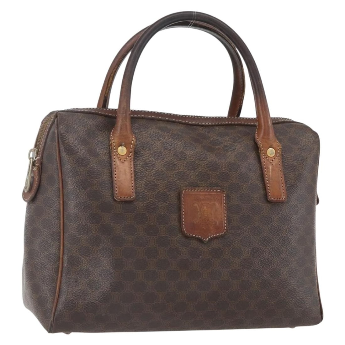 Celine Macadam Brown PVC Leather Handbag Gold Tone Accents: Celine Macadam Brown PVC Leather Handbag Gold Tone Accents This CELINE Macadam canvas hand bag features brown and gold PVC leather with signature detailing. The bag is made in Italy and includes a han