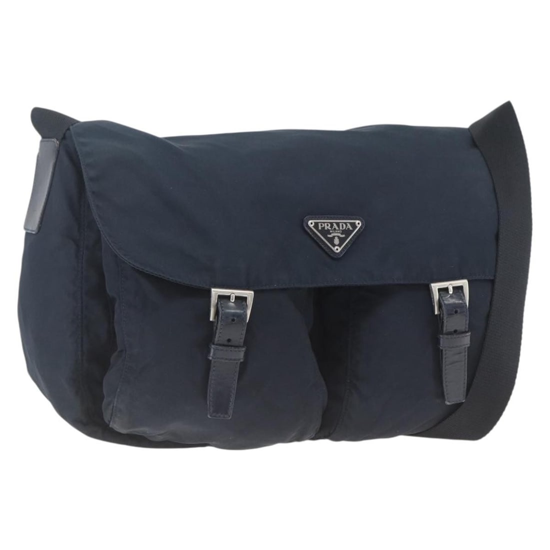Navy Nylon Shoulder Purse by Prada with Adjustable Strap: Navy Nylon Shoulder Purse by Prada with Adjustable Strap This PRADA shoulder bag features a navy nylon exterior with silver-tone accents. Crafted in Italy, the bag includes an adjustable shoulder stra