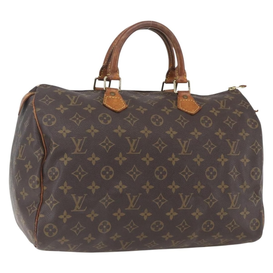 Louis Vuitton Speedy 35 Monogram Canvas Handbag M41524 France: Louis Vuitton Speedy 35 Monogram Canvas Handbag M41524 France This is a Louis Vuitton Monogram Speedy 35 handbag crafted from monogram canvas with natural leather trim. The bag features a spacious int