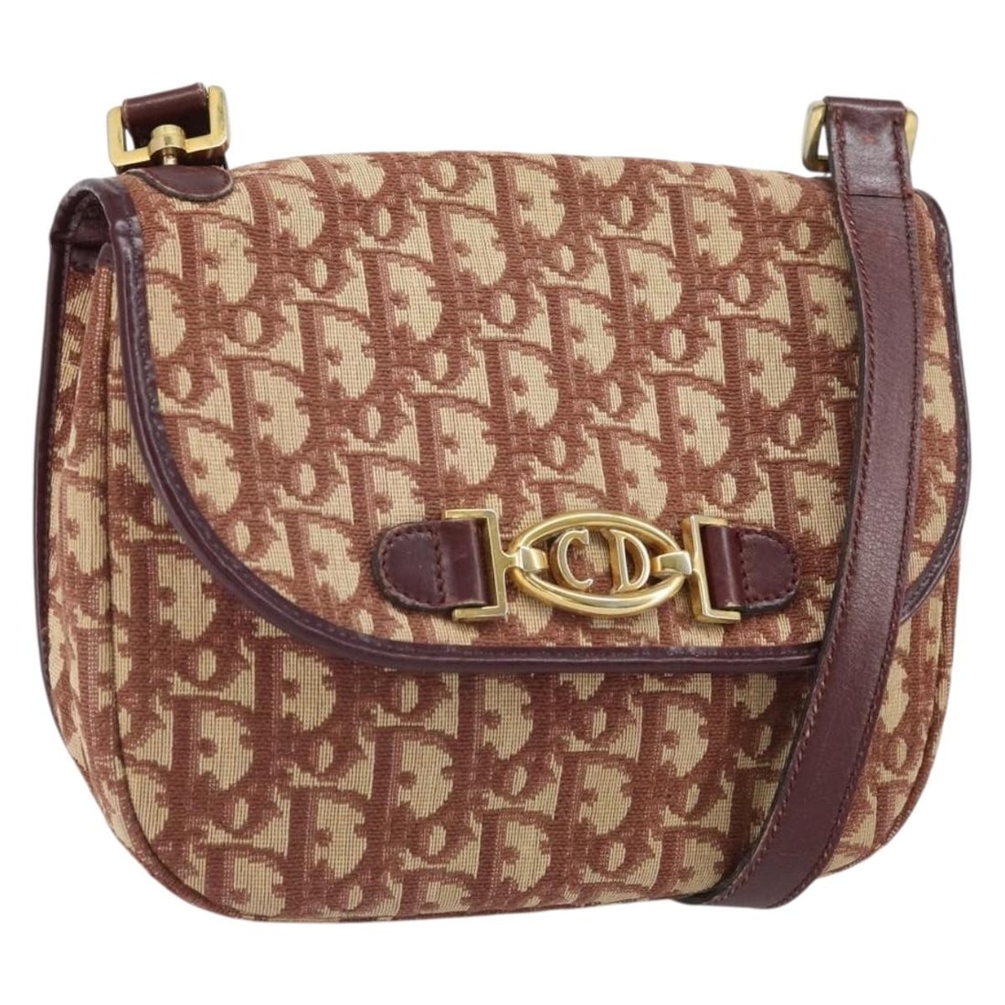 Red Trotter Canvas Christian Dior Shoulder Bag With Aftermarket Magnet: Red Trotter Canvas Christian Dior Shoulder Bag With Aftermarket Magnet This Christian Dior shoulder bag features the iconic Trotter canvas in red and gold tones. The bag is crafted in France and inclu