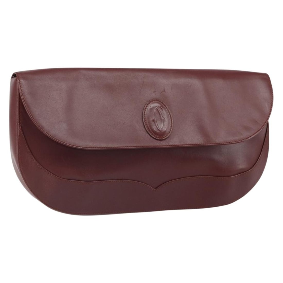 Bordeaux Leather Clutch by Cartier with Gold Tone Accents: Bordeaux Leather Clutch by Cartier with Gold Tone Accents This is a Cartier clutch bag crafted from bordeaux leather with gold-tone accents. The bag features a rectangular silhouette and offers a spac