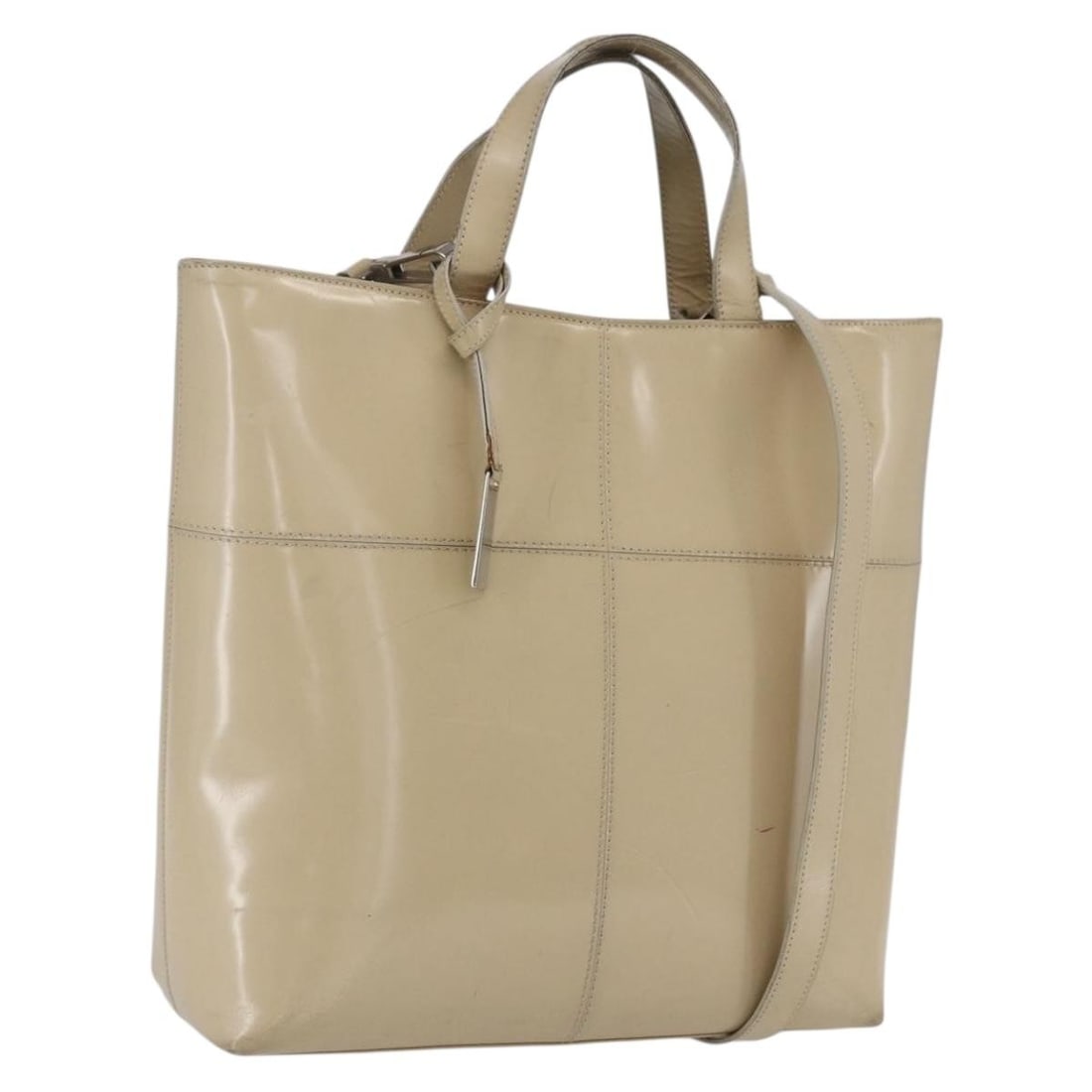 Beige and Silver Enamel 2-Way GUCCI Tote Bag with Shoulder Strap: Beige and Silver Enamel 2-Way GUCCI Tote Bag with Shoulder Strap This is a GUCCI 2-way tote bag crafted from beige and silver enamel. The bag features both handles and a detachable shoulder strap for