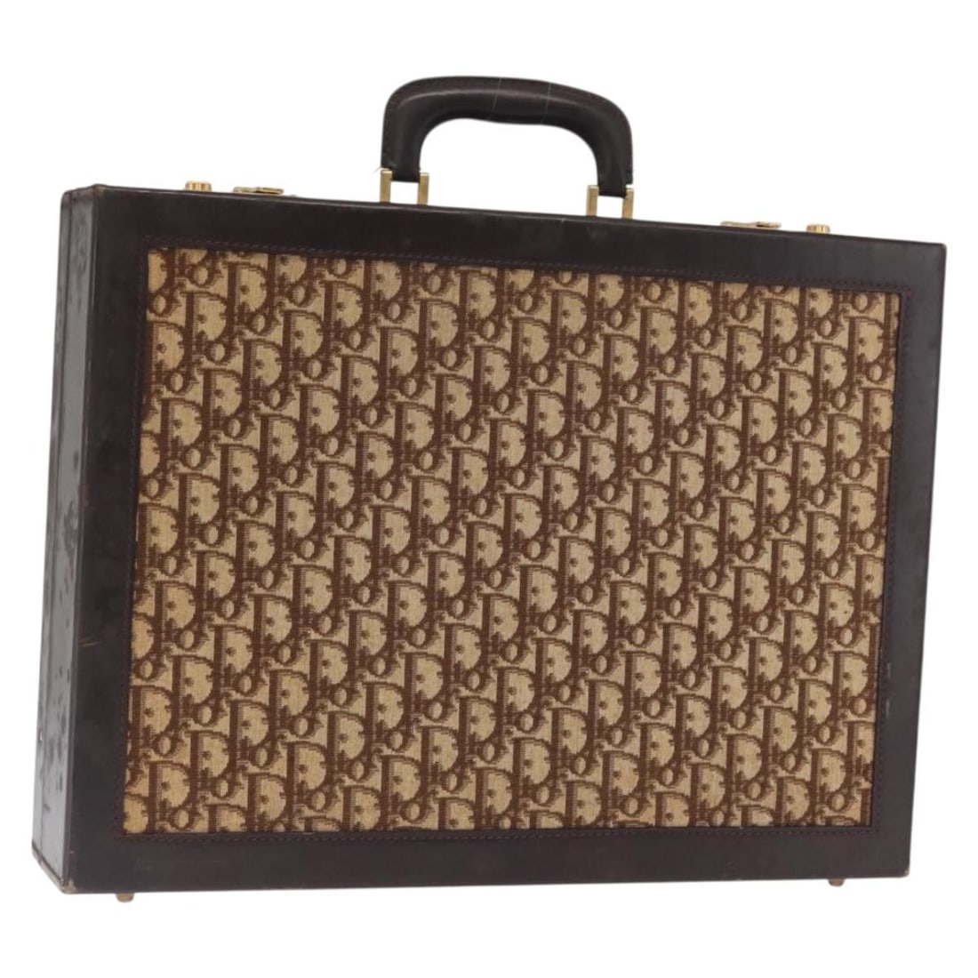 Brown Gold Trotter Canvas Trunk by Christian Dior: Brown Gold Trotter Canvas Trunk by Christian Dior This Christian Dior trunk features the signature Trotter canvas in brown and gold tones. The trunk has a structured silhouette with a handle drop of a
