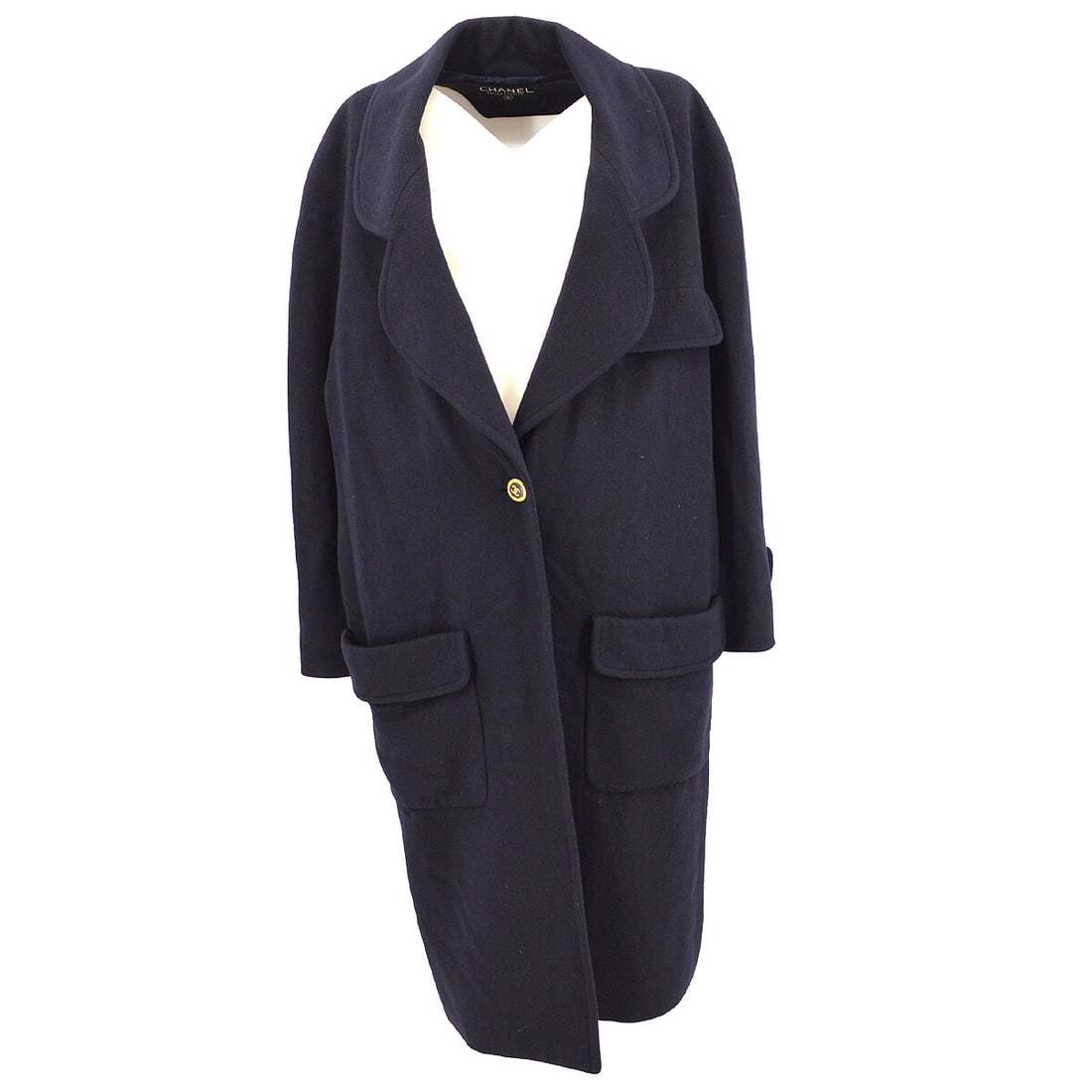 Chanel Navy Cashmere Long Sleeve Single Breasted Overcoat: Chanel Navy Cashmere Long Sleeve Single Breasted Overcoat Elevate your wardrobe with this exquisite Chanel single-breasted long sleeve coat, crafted from luxurious 100% cashmere. This navy overcoat fe