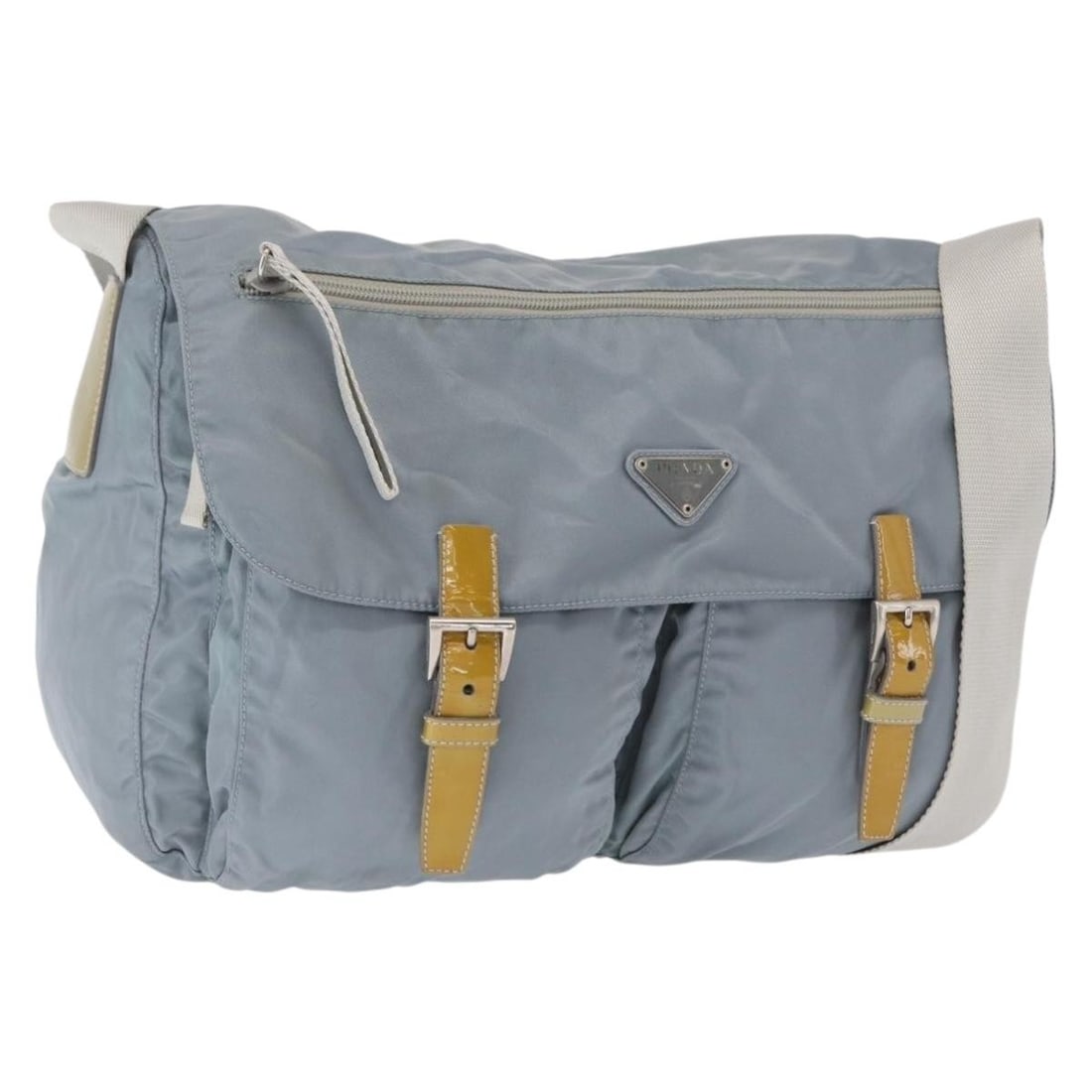 Light Blue Nylon PRADA Shoulder Bag Silver Tone Hardware Italy: Light Blue Nylon PRADA Shoulder Bag Silver Tone Hardware Italy This PRADA shoulder bag is crafted from light blue nylon with silver-tone accents. Made in Italy, it features an adjustable shoulder stra